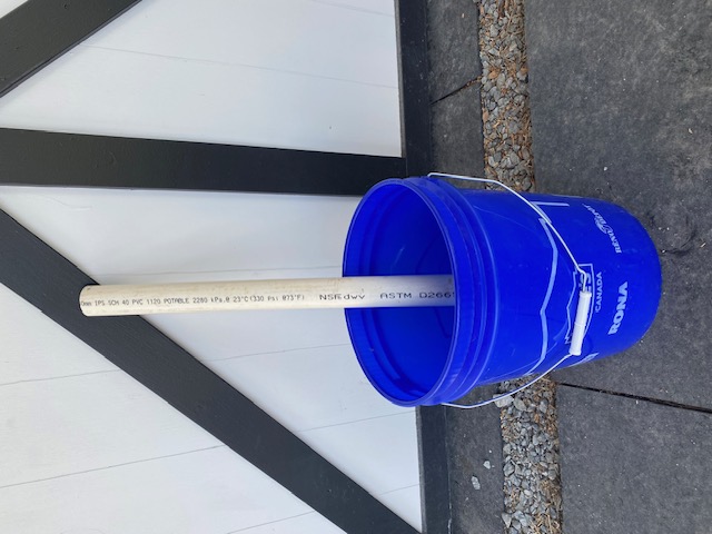 Pole in bucket